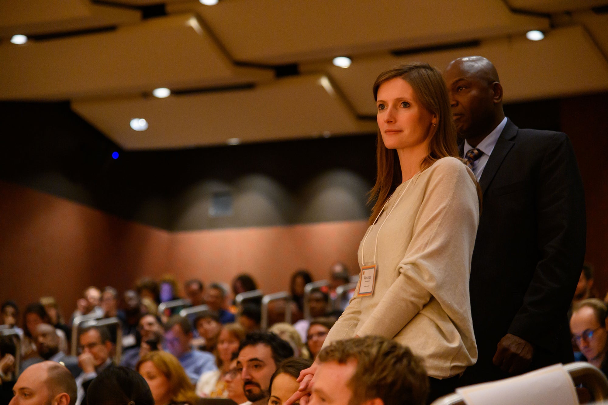 Audience in Fisher Colloquium listening to a speaker