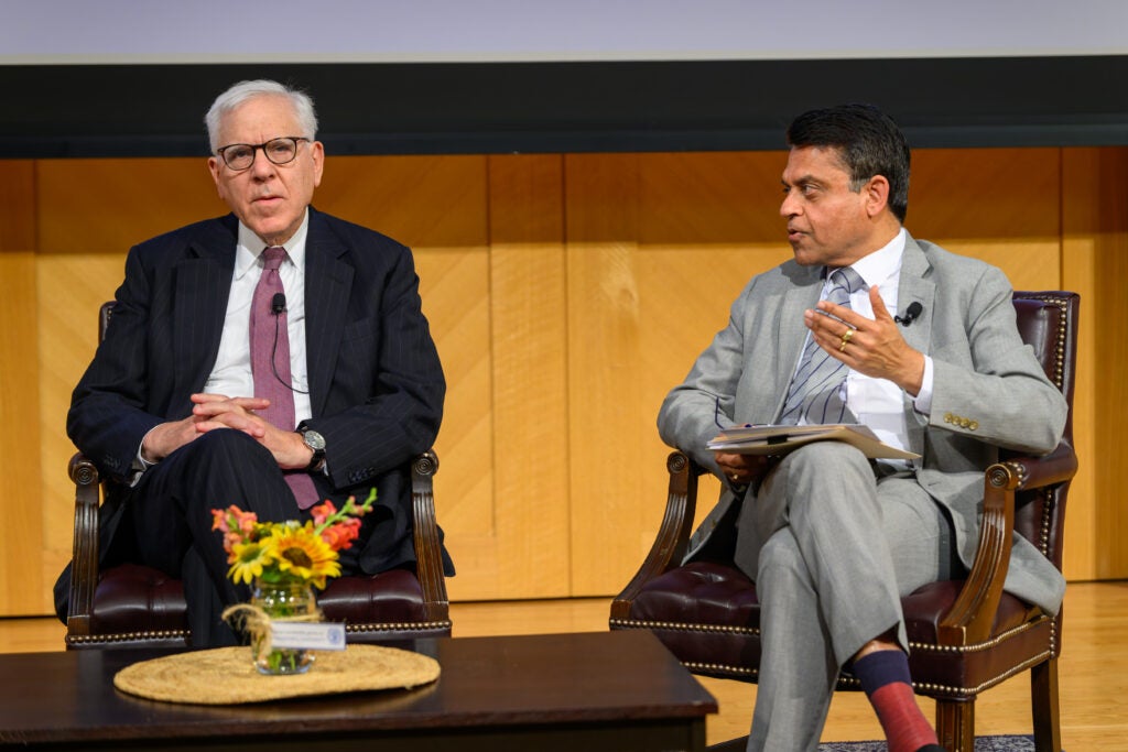 Anil Khurana, executive director of the Baratta Center and David Rubenstein, co-founder and co-chairman of the Carlyle Group, shared his insights on the current challenges facing cross-border investment on a well lit stage.