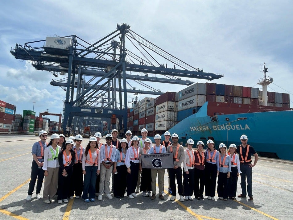Georgetown students visit an active shipping port